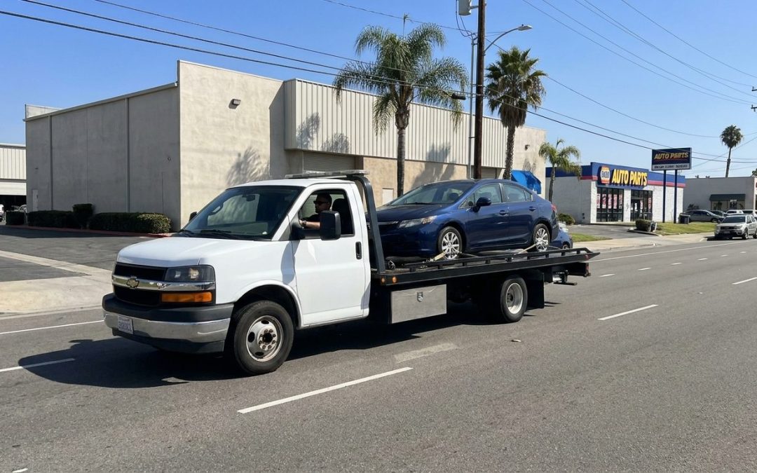 Ramirez Towing SD flatbed truck on Balboa Avenue in Kearny Mesa